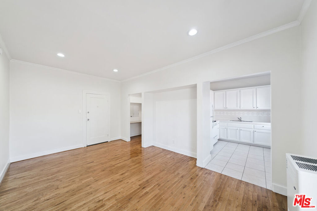 $1750 with parking ALL UTILITIES INCLUDED! Welcome to this bright and inviting studio apartment nestled in the heart of prime Echo Park. This cozy unit boasts a separate kitchen area, complete with essential appliances such as a stove and fridge, making meal preparation a breeze. With ample storage space in the kitchen, you'll have plenty of room to organize all your culinary essentials. The studio includes a unique featurean adjoining makeup room that seamlessly leads into the bathroom, equipped with a convenient shower-bathtub combo for your comfort and convenience. Additionally, the unit offers abundant storage solutions, ensuring you have ample space to stow away belongings and keep your living area clutter-free. For added convenience, this apartment comes with assigned guaranteed parking, providing you with peace of mind and hassle-free parking in this bustling neighborhood. Situated in a highly desirable area, you'll find yourself close to all the amenities and attractions that Echo Park has to offer, making this unit an ideal choice for comfortable and convenient living.