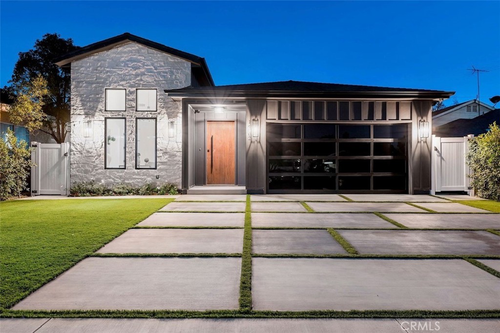Welcome to this stunning modern farmhouse-style single-story home, built in 2022 and nestled on a spacious 6,115 sq ft lot in prime Sherman Oaks.
Flooded with natural light and featuring soaring ceilings, this thoughtfully designed residence is perfect for both luxury living and entertaining.
- An open-concept floor plan with hardwood floors and a seamless flow from the kitchen to the great room and dining area.
- The chef's kitchen is equipped with a generous island, premium stainless steel appliances, dishwasher, disposal, and microwave.
- Living room complete with a cozy fireplace and expansive multi-panel sliding doors that open to a backyard oasis.
Located in the highly desirable 91403 ZIP code, this home offers easy access to Sherman Oaks shops, cafes, top-rated schools such as Kester Elementary, and convenient commuter routes into Los Angeles. Flexible lease options are available, ranging from a minimum of 1 month to a 12-month lease, making it ideal for both short-term stays and long-term living. Please, no smoking.
