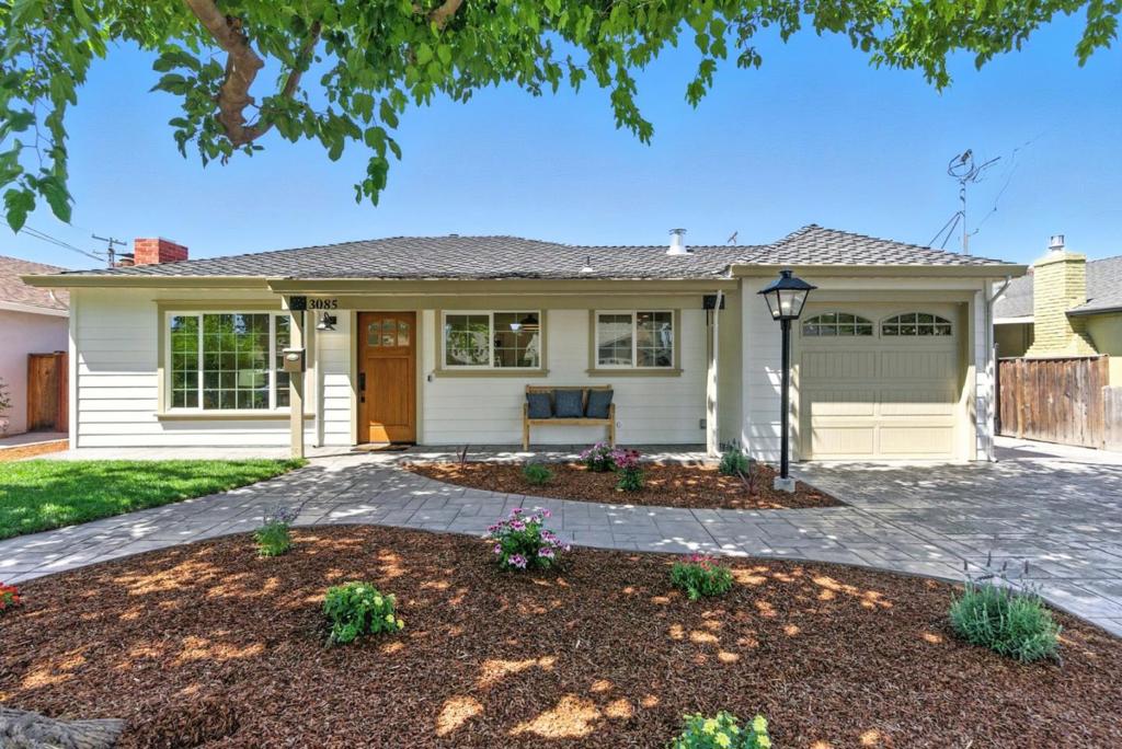 Originally built in 1948 as a 2bed, 1bath cottage, this beautifully expanded single story is now 4 beds, 3 well designed baths, w/ over 2200 sf of living space thoughtfully reimagined in 2010. The curb appeal is undeniable. Lush grass, colorful plantlife, and beautiful stamped concrete. It's the perfect balance between timeless charm and modern finishes. The kitchen is a showstopper with GE Cafe stainless steel appliances, ideal for the home chef or entertainer. Bamboo flooring flows through the living spaces, ceramic tiled kitchen, while luxury Pergo adds comfort and durability in the bedrooms. Each bathroom has designer tilework and standout features like the Kohler clawfoot tub in the primary suite, complemented by matte black classical fixtures. Sitting on a generous 7500 sq ft lot, the backyard is a dream. A spacious play structure, endless seating possibilities, and room to build your dream outdoor kitchen or an ADU. Need storage? You're covered with an attached 1 car garage with a laundry area, plus an oversized detached 2 car garage, and still plenty of space for an RV, boat, or multiple vehicles.This is a home where pride of ownership shines through. A rare opportunity to enjoy space, style, and functionality all in one of Santa Clara's most desirable neighborhoods.