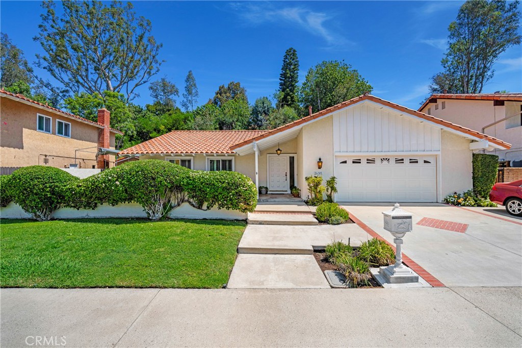SINGLE STORY HOME | 3 BEDROOMS/2 BATHS | WALK TO SCHOOLS | Great opportunity! This home is ideally situated close to schools, shopping, restaurants, and renowned Lake Mission Viejo. Located in the desirable La Paz neighborhood you will appreciate this homes' curb appeal. From the front courtyard a light and bright entry leads to the formal living room whose focal point is the fireplace. The dining rooms built in bookcases add warmth and a place to display your collectibles and artwork. A bright kitchen includes direct access to the spacious side yard ideal for entertaining. Three bedrooms, two situated in the front of the house and the private primary with en-suite overlooking a peaceful retreat in the backyard. Two-car garage and a very spacious driveway. Membership in Lake Mission Viejo includes picnic areas, playground, sandy beaches, boating, and fishing. Enjoy summer concerts under the stars and Movie Nights held at this spectacular venue overlooking Saddleback Mountain. Walking distance to Linda Vista Elementary, La Paz Intermediate, and Mission Viejo High School and easy access to Kaleidoscope, Mission Viejo Mall, and the 5 freeway. (Note-Home and lawn are virtually staged.)
