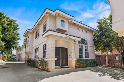 Photo of 309 S Almansor St, Alhambra, CA 91801 (MLS # CV26079661)