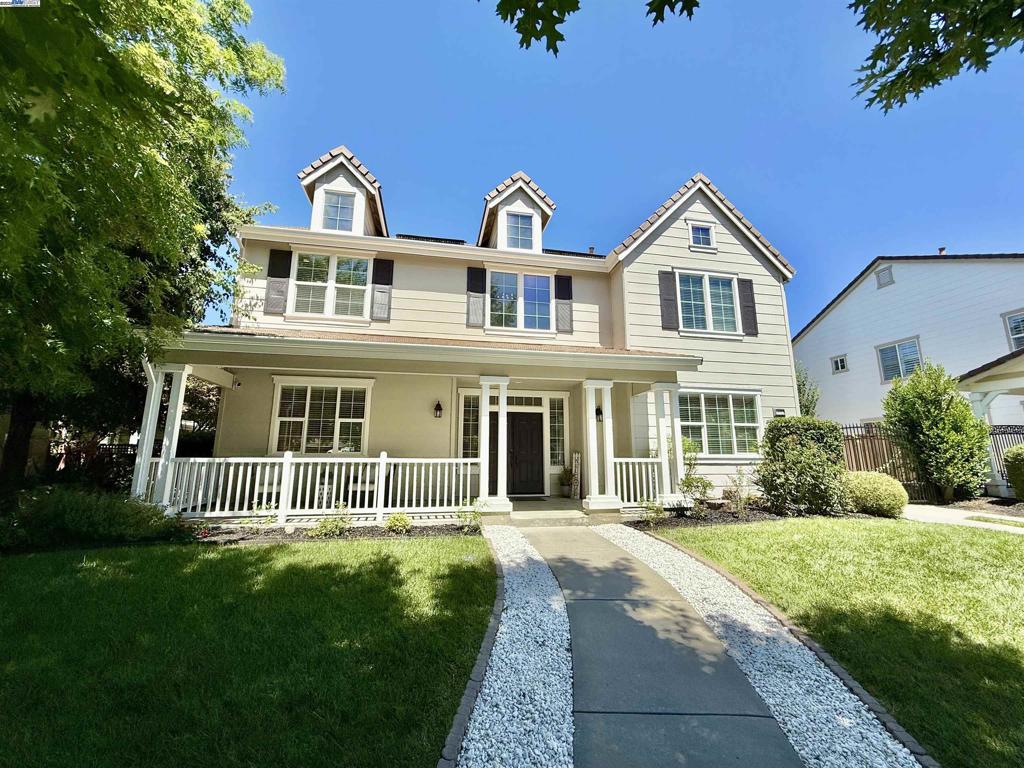 Welcome to this stylish and sophisticated home located in the prestigious Lindenwood neighborhood in the heart of South Livermore’s wine country. From the charming front porch to the striking grand staircase and modern chandelier, this home is full of impressive features and thoughtful design. As you enter, you will love the beautiful engineered wood flooring throughout the main level. The formal living and dining rooms offer ideal spaces for entertaining, while a main level 5th bedroom, is conveniently located next to a full bathroom, perfect for guests. The updated kitchen with large island is a chef’s dream, showcasing sleek quartz countertops, crisp white cabinetry, and stainless-steel appliances. It opens to a spacious family room, ideal for gatherings and everyday living. Upstairs, you’ll find four generously sized bedrooms PLUS a huge bonus room. Relax in the massive primary suite with a walk-in closet and large bathroom with separate dual vanities. Outside, a long driveway with an automatic security gate leads to a detached three-car garage. The serene, low-maintenance backyard offers a tranquil escape. Just minutes from outdoor adventures, wineries, and the vibrant shops and restaurants of downtown Livermore. This is the perfect home for you!