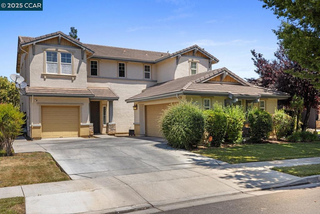 REDUCED PRICE!!! Nice, upgraded and well-maintained 2-story house located in Patterson Gardens. Built in 2005. This 2,639 sq. ft. house has 4 bedrooms and 2-1/2 bathrooms and is situated in 7,104 sq. ft. level lot. There is a bonus room or an office with built-in desk near the kitchen. Except for the main entry, primary bathroom and laundry room, there are waterproof laminate floorings throughout the house. On the 2nd level near the stairs, there is a small area that can be used as kid's study or gaming area. Landscaped front and rear yards. There are several fruit trees in the backyard. Near park, shopping, schools, restaurants and freeway. Refrigerator, washer/dryer, video doorbell and camera are included with the sale.