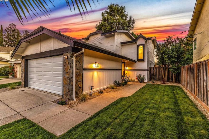 You will LOVE this easy living home with this adorable and affordable single family home! All you need to live well with the incredibly light, and bright floor plan. Vaulted ceiling family room boasts brick fireplace and opens to kitchen/dining room. Today's designer trends with all black lighting fixtures, bathroom fixtures, and coordinating black handles/knobs.  Embrace the recessed kitchen lights in the kitchen along with stainless appliances. Space where you need with primary bedroom upstairs that could easily host your California king bed plus gracious furniture! Best location living with quick access to everything! Down the street from restaurants, grocery store, and service/boutique shops. Great commute location not far from 580 and 680, public transportation, and convenient commute options. Wonderful floor plan with a full bedroom and bathroom downstairs and separate bedroom and bathroom space upstairs for today's easy living. Just down the street from the Pleasanton Tennis and Community Park. Enjoy the tennis/pickle ball courts, basketball courts, massive lawn park, play structure area, and walk/running trails just across the way from this unit.  See what awaits at 6056 Corte Encinas while you have the chance! DON'T MISS THIS EXCEPTIONAL HOME!