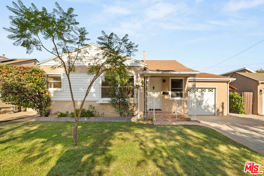 This traditional home presents an exciting opportunity to create an oasis that truly reflects your vision. With a solid layout and spacious lot, this property offers great bones and is ready for updates. It's the perfect choice for buyers eager to customize, renovate, and add their own style. The rear bedroom includes an attached ADU space with separate kitchen and bathroom, ideal for hosting family and guests. The back yard creates an ideal scene for entertaining under a covered gazebo, replete with a verdant lemon tree and a covered patio area that adjoins an additional enclosed patio area with wood ceilings. The location is ideal just minutes from the studios, Magnolia Park's boutiques and cafes, and the shopping and dining at the Burbank Town Center. Outdoor enthusiasts will appreciate the proximity to Griffith Park and hiking trails, and convenient freeway access make this a sought-after neighborhood for both work and play. Bring your imagination and transform this property into the beautiful home you've been waiting for.