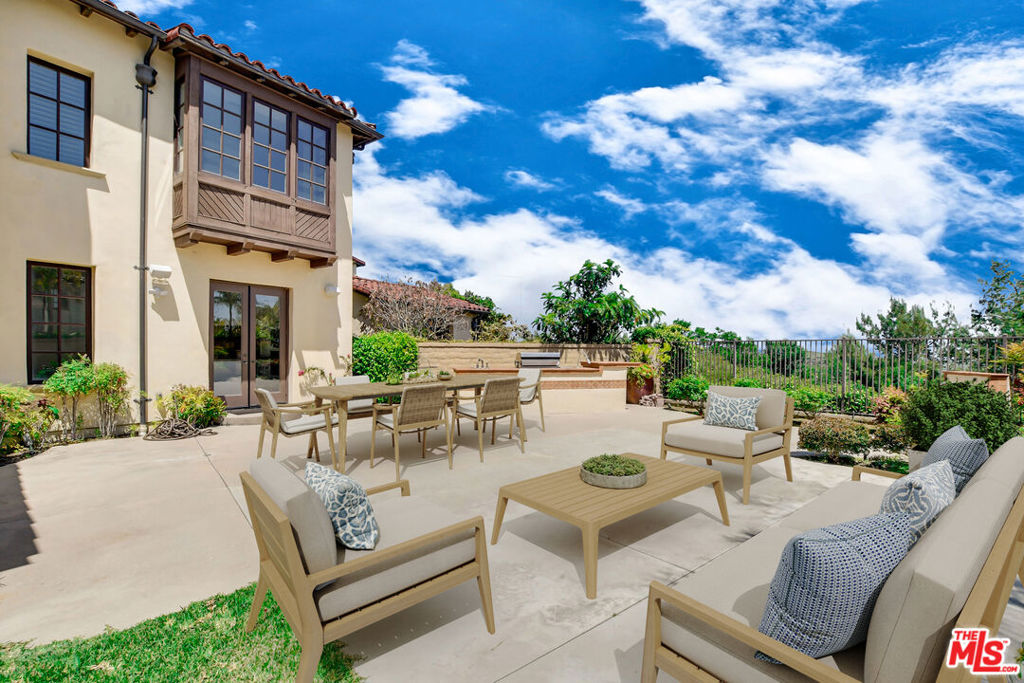 This sophisticated Tuscan-style residence is nestled in the highly coveted community of Pacific Ridge, Belcara subdivision. This light and bright home boasts a prime corner lot location offering panoramic views of the ocean, city lights, canyons, and the Saddleback Mountains. Step into the home through a picturesque courtyard surrounded by mature olive trees, and discover a thoughtfully designed floor plan with 1 ensuite bedroom downstairs and 2 bedrooms upstairs, including the Master bedroom. The gourmet kitchen features granite countertops, top-of-the-line stainless steel appliances, a built-in refrigerator, 6-burner stove, custom cabinetry, and a walk-in pantry. Throughout the home, you'll find tasteful details such as premium hardwood flooring, high ceilings, LED recessed lighting, French doors and much more... The cozy living room, centered around a fireplace, is perfect for entertaining guests. The spacious backyard offers views of the ocean, canyon, and city lights, providing an ideal setting for gatherings or quiet relaxation. Situated close to award-winning schools, world-class shopping, dining, the Pelican Hill Resort, 73 Freeway, and John Wayne Airport, this location is highly sought after. Residents of Pacific Ridge enjoy resort-style amenities including a Jr. Olympic-sized swimming pool, spa, wading pool, outdoor fireplace, cooking area, and convenient access to hiking, biking trails, and nearby beaches. Some of the photos are virtually staged.