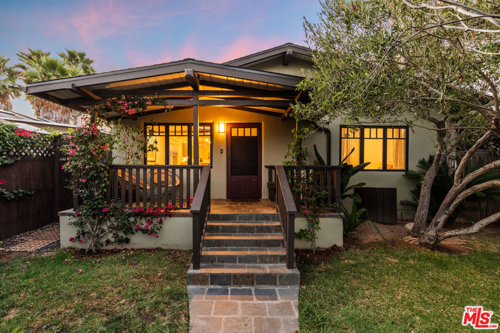 Nestled behind custom wood doors on one of Venice's most desirable streets, this beautifully updated 3 bedroom, 2.5 bath California bungalow perfectly blends timeless character with contemporary living. From the moment you step through the lushly landscaped front garden with blooming bougainvillea and onto the inviting porch, you will feel instantly at home. Inside, abundant natural light showcases hardwood floors, vaulted ceilings, and elegant skylights. The kitchen seamlessly flows into a welcoming living space, ideal for relaxed evenings or entertaining friends.The primary suite offers a serene retreat with a spacious walk-in closet and direct access to the wraparound wooden deck, featuring a luxurious hot tub and integrated outdoor sound system perfect for sunset gatherings or peaceful relaxation. The backyard is an entertainer's dream, set on a large lot for the area, with lush landscaping, a fire pit, and multiple seating zones designed for both intimate evenings and lively celebrations. Ample parking adds convenience, a rare luxury in this neighborhood.Situated in a family-friendly pocket of Venice, this home is just minutes from Oakwood Park and Broadway Elementary, renowned for its outstanding dual language immersion programs in Mandarin and Spanish. Perfect for those who value outdoor recreation with a grassy field and playground, a strong sense of community, and exceptional education.All this, plus being only seconds from the vibrant dining and shopping scene of Abbot Kinney Boulevard and just a short stroll to Venice Beach, makes this beautifully maintained property the ideal blend of comfort, charm, and coastal living.