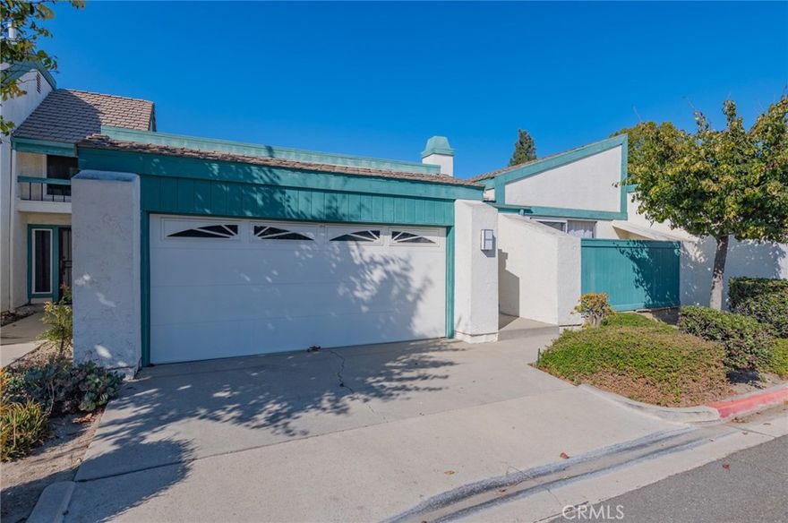 Welcome home to this charming single story 3 bedroom, 2 bathroom "Atrium model" home that has been upgraded with new carpet and paint. A true open concept with high vaulted ceilings, large windows, and sliding doors that fill the home with natural light and fresh air. This unit shares only two common walls and has direct garage access, making it feel like a single-family residence. The cozy and stylish fireplace is a focal point in the living room, with access to the front patio.  The primary bedroom is the perfect place to retreat with a beautiful view of the atrium patio, accessed directly through a sliding door. There's a spacious walk-in closet in the primary bedroom, with ensuite bathroom. The convenient attached 2 car garage offers direct access to the home. The atrium patio features a large fountain - the perfect place to relax and drink your morning coffee. The Garden Greens Community has low association dues and features spacious greenbelts, walking paths, a swimming pool, spa and a picnic area. This property is close to major freeways, shopping, and Huntington Beach sandy beaches. Located in the top-rated GGUSD school district that includes Garden Park Elementary, Bell Intermediate, and Pacifica High School (Top rated school district). Don't miss this unique opportunity!
