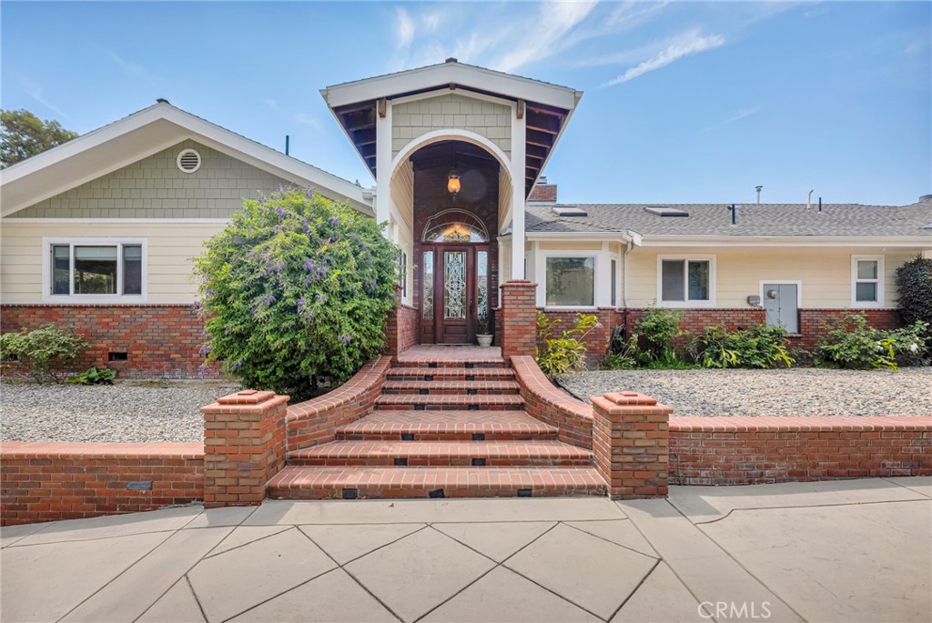 Spectacular traditional located in a very private location. Home has over 3800 square feet in knollwood country club. Absolute quality thru out from drive way to 3 car garage and extra parking Custom entry doors opening to 18 foot vaulted ceilings Custom kitchen with designer cabinets, custom drawers, dcs range, built in viking refrigerator, huge granite island and built in wine refrigerator. Kitchen also has breakfast nook.Large single story with open floor plan with step down family room with hardwood floors, vaulted ceilings large wet bar with seating for 8 and a stone fireplace. Entertainers dream with 3 bedrooms and the primary bedroom has walk in closet, sitting area which could be used as office or work out room. also has dual fireplace that enters lage bathroom with jacuzzi tub Expansive living room with fireplace and adjacent formal dine. Duale pain windows and custom lighting thru out.Detached 3 car garage with rec room , could be used as a granny flat. Private back yard with covered patio. To many features a must see.