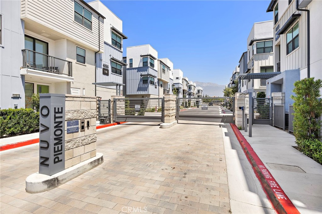 Welcome to 944 N Divino Privado Unit 57, Ontario, CA 91764 — a stunning modern condo ideally located in the heart of Ontario’s vibrant urban core, within the desirable gated community of NUVO Piemonte. Enjoy unmatched convenience with Target, Sam’s Club, Ontario Mills, and a variety of popular dining and entertainment options like Big Al’s and 4th & Mill all within walking distance. With easy access to major freeways, commuting and weekend getaways are both effortless. This beautifully designed residence offers approximately 1,596 square feet of thoughtfully planned living space across three spacious stories, featuring 3 bedrooms and 3.5 bathrooms, perfectly blending comfort and function for today’s lifestyle. Inside, you’ll find a warm, stylish interior with an inviting layout, ideal for both everyday living and entertaining. Each level has been designed to maximize privacy and utility, making it a truly comfortable place to call home. Located in NUVO Piemonte, a gated community that offers well-maintained common areas, including outdoor fire pits, shaded picnic spots, and dog-friendly green spaces — perfect for relaxing, socializing, or enjoying time with your pets. Don’t miss this exceptional opportunity to own a move-in-ready home in one of Ontario’s most connected and desirable locations. Schedule your private tour today!