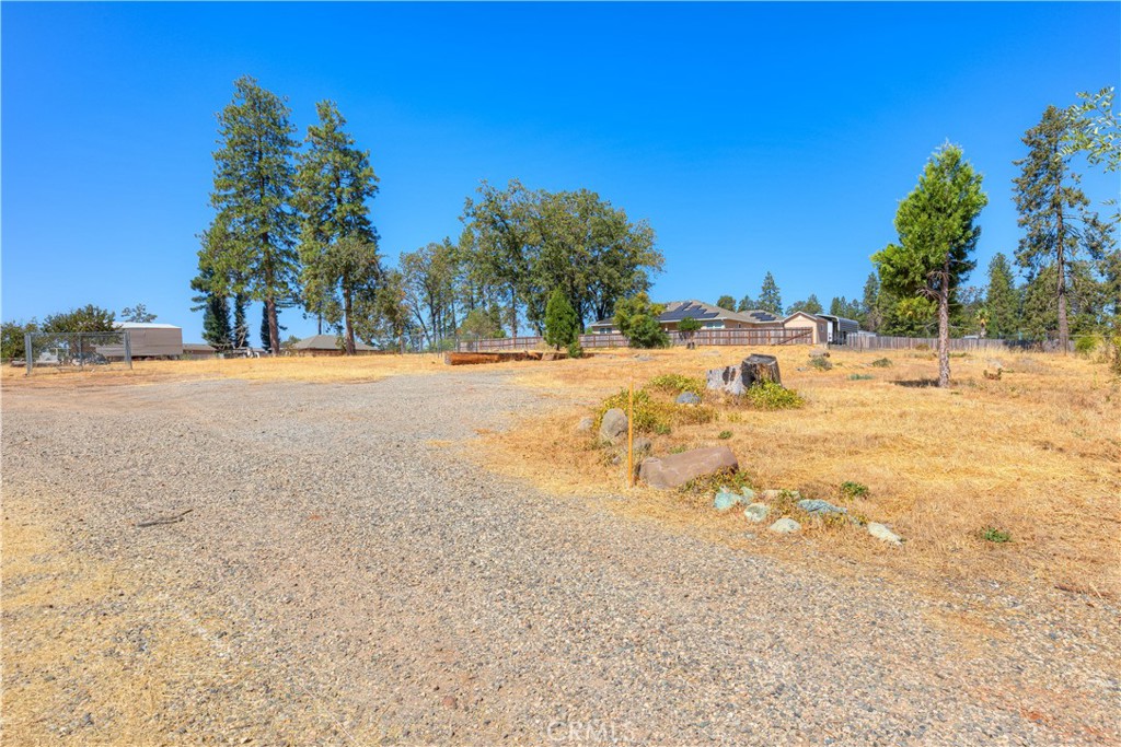 Nearly an acre of land is waiting for your vision, with the neighboring 0.88-acre parcel at 1150 Nor Way also listed separately for sale! This property once featured a 4-bedroom, 1-bath, 1,289 sq. ft. home and is now ready for a fresh start. Tucked away in the charming community of Paradise, this spacious lot provides the perfect blend of tranquility and convenience just minutes from shopping, dining, and everyday essentials. Outdoor enthusiasts will love the easy access to nearby lakes, trails, and endless recreation like fishing, boating, biking, and more. With utilities already in place—including active PID water—you’ll save thousands in connection costs, making this property an incredible value for either a personal build or an investment project.