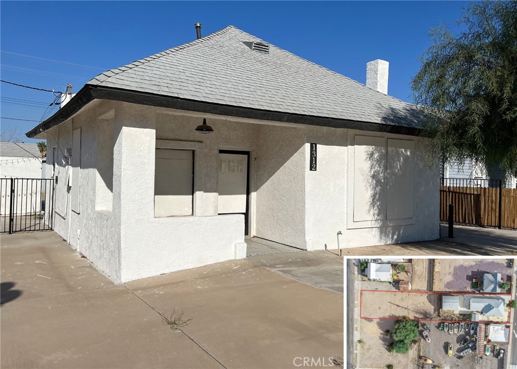 PRIME LOCATION! SALE TO INCLUDE 1315 FRONT STREET! BOTH LOTS COMBINED EQUAL 14,000 SQ FT! Zoned Commercial/Residential on HISTORIC ROUTE 66!!! ORIGINAL hardwood floors throughout. Tall ceilings, built in hutch and book case. Two, very large, bedrooms and one full bathroom. Spacious kitchen with TONS of cabinets. Bonus room and large storage room that could be easily converted into a second bathroom. All new ceiling fans and light fixtures through out. Shed with even more storage space and washer and dryer hook ups. 24'W x 28'D Detached Garage with 7'T x 15'W door with automatic opener. Plenty of room to park your River or Off-Road toys with the additional lot behind the home being included build another home on that lot!!!! Approximately 1.5 miles from Jack Smith Launch Ramp, Needles Resort Marina and Needles Golf Course.