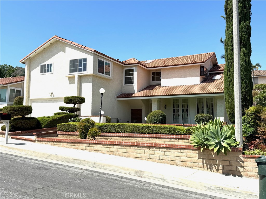 Well maintained charming Home located in the elegant and peaceful neighborhood in Hacienda Heights…..Bright and airy living room with french windows…..Formal dining room with backyard view…..Open kitchen adjacent to the spacious and comfortable family room…..There is a powder room and a separate laundry room downstairs.....All four bedrooms are upstairs.....Specious and bright master suites with high ceiling and city light view.....Plus another 3 well-sized bedrooms and a recently remodeled bathroom.....Two of the bedrooms have split air conditioners installed is a special plus.....A huge bonus room on the other side of the second floor that has endless possibilities for family together.....The backyard has a swimming pool and various fruit trees.....Conveniently located with outstanding access to restaurants, supermarkets, medical facilities, and everyday amenities.
