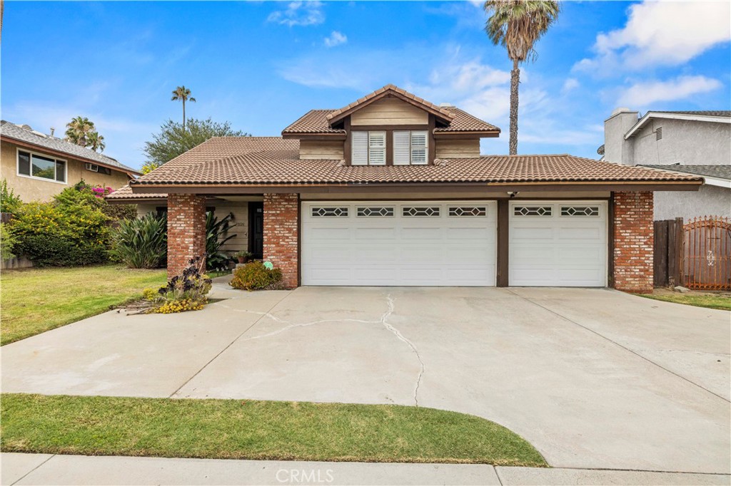 Spacious and updated two-story home offering over 2,000 square feet of living space in a centrally located Winnetka neighborhood. Conveniently situated between Westfield Topanga & The Village and Northridge Fashion Center, with easy access to both the Ventura and Simi freeways. Nearby parks, schools, and places of worship provide added convenience.
The home features a step-down living room with cathedral ceilings and a custom brick fireplace and mantle. The remodeled kitchen includes quartz countertops, a tile backsplash, stainless steel appliances, and connects directly to the adjacent dining area. Hardwood floors extend throughout the main level, while the second level features carpeting.
The primary suite offers vaulted ceilings, an ensuite dressing area, and a private bathroom. Two additional bedrooms include plantation shutters and upgraded closet systems. A spacious loft provides additional flexible living space. The home also includes a tankless water heater, a remodeled powder room downstairs, and two full bathrooms upstairs. The backyard features mature fruit trees and space to entertain. The three-car garage includes modified doors and custom shelving.