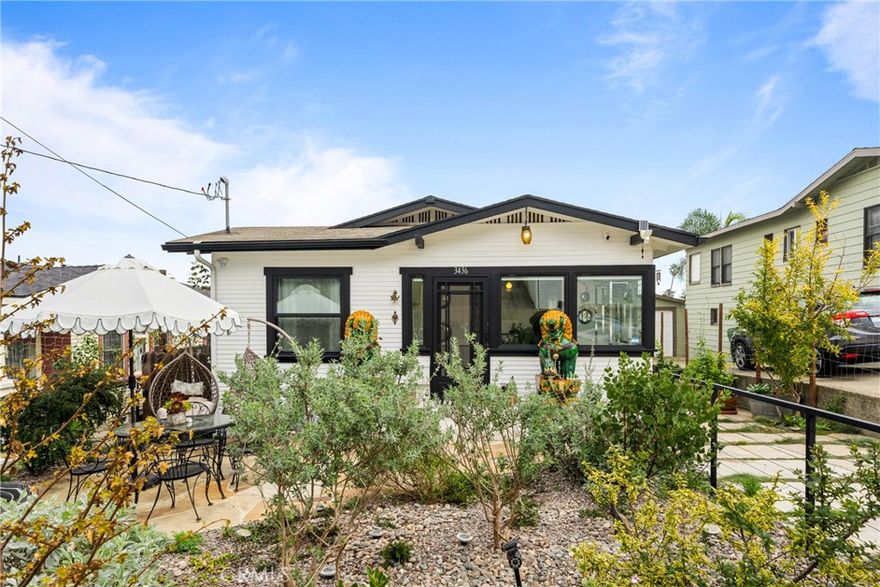 This remodeled coastal cottage blends historic charm with modern updates in one of San Pedro’s most desirable beachside neighborhoods. Offered as a month-to-month rental with a minimum three-month stay and a maximum term of one year, the home is located just a short distance from Cabrillo Beach on the gentle slopes of the Whiskey Flats area. The interior features refinished wood floors, a marble-floor entry suitable for a small workspace, and an updated eat-in kitchen equipped with a new stove, refrigerator, microwave, dishwasher, and an in-kitchen washer and dryer. New casement windows in the bedrooms and bathroom provide natural light and coastal breezes, while updated voile and linen curtains, privacy blinds, and dimmable lighting add comfort throughout the home. Furnishings include a curated blend of mid-century and modern pieces, new beds and linens, original artwork, and large houseplants.

Outdoor living spaces include a balcony off the kitchen with a peek-a-boo ocean view, a private front garden with drought-tolerant landscaping, solar pathway and hanging lighting, and a small bubbling fountain. The front patio offers dining and seating areas, with additional seating along the side driveway. The property also provides an outdoor clothesline, secure locked bike storage, and under-house storage space. Convenience features include keyless entry and multiple exterior motion-sensor lights. Garden maintenance is provided one to two times per week to maintain the landscaping and outdoor areas.

The home is located near a neighborhood café, diner, and market, with convenient access to Trader Joe’s, Sprouts, local movie theaters, and the 110 freeway. Downtown San Pedro offers a weekly farmers market, restaurants, fitness studios, creative spaces, and the upcoming West Harbor waterfront development. A seasonal weekend tram from Cabrillo Beach connects the area to the downtown district, adding to the convenience and coastal lifestyle this location provides.