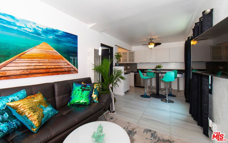 **Short-Term Lease Available in the Heart of Venice Beach!** Enjoy the last days of summer or bask in the California sunshine year-round! As you enter, beautiful, large potted plants welcomes you in the corridor leading to the front door. Cozy and comfortable bungalow is sparkling clean and just blocks from the ocean.**Bedrooms:** Spacious with plenty of closet space.  **Kitchen:** Equipped with a microwave, refrigerator, stove and new granite countertops.    **Living Spaces:** Features tile flooring and ceiling fans in both the living area and primary bedroom. The open layout is perfect for dining and entertaining.   **Outdoor Space:** The covered patio is an ideal spot to sip your morning coffee and unwind.  **Parking & Security:** One assigned off-street parking space is available. The property features a security keypad entry, gated access, and is fully fenced for privacy.  This location is just steps away from the vibrant cafes and shops on Rose Avenue, a short stroll to the boutiques and restaurants on Abbot Kinney Blvd, and minutes from the famous Venice Boardwalk. Enjoy nearby yoga studios, gyms, local markets, and art galleries, with easy bike access to Santa Monica and Marina del Rey.Experience the best of Venice Beach living in this charming, secure, and conveniently located home!