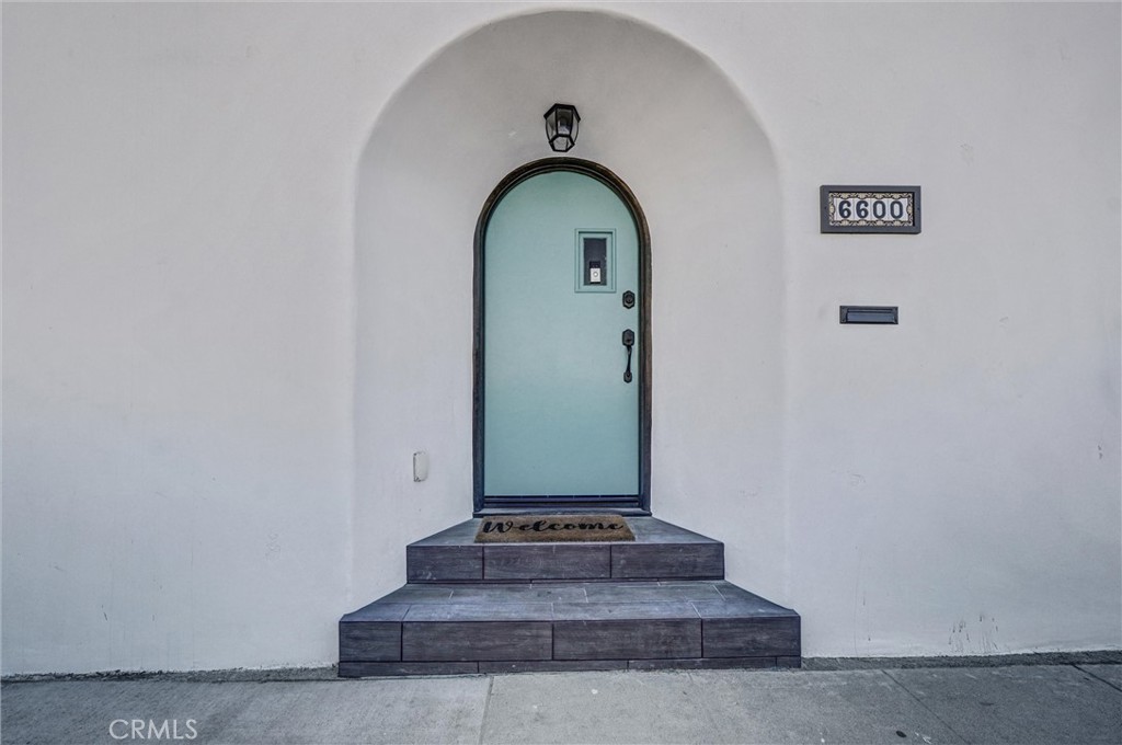 Welcome to this beautifully remodeled 3-bedroom, 3.5-bath beach house, perfectly positioned on a premium corner lot in the highly sought-after Long Beach Peninsula. Just steps from Alamitos Bay and the Pacific Ocean, this home captures the best of coastal living with modern comfort and timeless charm.
Inside, you’ll find a spacious, open-concept floor plan filled with natural light. The stunning chef’s kitchen showcases brand-new appliances and flows seamlessly into the living and dining areas—ideal for both everyday living and entertaining. Highlights include koa wood ceiling fans, a built-in speaker system, and a convenient indoor laundry room. Upstairs, a newly constructed deck offers the perfect spot to unwind and enjoy ocean breezes at the end of the day.
One of the few homes on the Peninsula with a large enclosed yard, this property provides an inviting space for gatherings under bistro lights. The oversized detached garage features a pulley storage system for kayaks and bikes, plus its own bathroom and outdoor shower—perfect for beach days. Additional upgrades include new kitchen and bathrooms, double-pane Pella windows, forced air heating, and thoughtful finishes throughout.
Whether you’re seeking a full-time residence, a weekend retreat, or an income-generating property, this home delivers. All just minutes from Belmont Shore’s vibrant dining, shops, parks, and events.