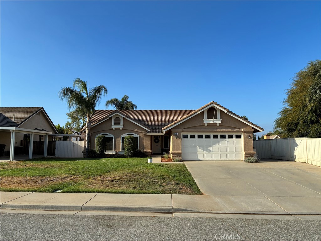 Discover this cozy 3-bedroom, 2-bathroom gem, nestled on a serene cul-de-sac in Calimesa. High vaulted ceilings throughout most of the home create a spacious feel, complemented by a versatile bonus area perfect for an office or dining room. Enjoy a cozy fireplace, energy-efficient dual-pane windows, a tankless water heater, and modern vinyl plank flooring. Relax outdoors on the covered patio as well as an above-ground spa. Save big with fully paid solar panels. Modern, efficient, and move-in ready.