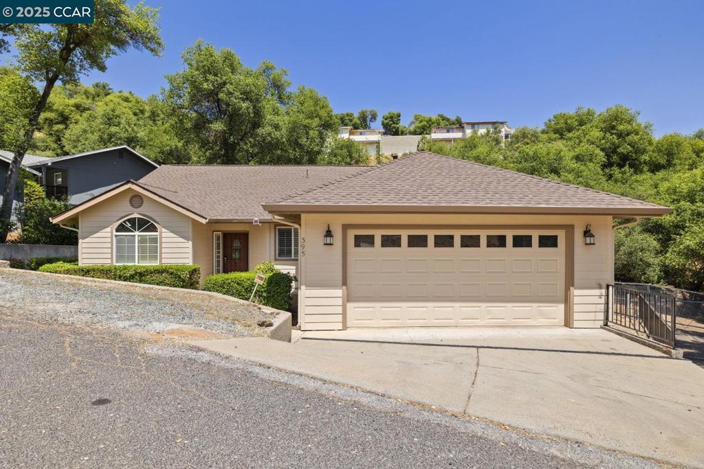 Welcome home to this beautifully maintained 4-bedroom, 2-bath offering nearly 1,800 sqft of easy, single-level living. Ideally located within Sonora city limits, you’ll enjoy close proximity to scenic Dragoon Gulch Trail and just minutes from the charm of Downtown Sonora’s shops, restaurants, and farmers markets. This home features a Brand New Roof, fresh interior/exterior paint in many areas, & low-maintenance lot with public utilities + central heat & air. Inside is a spacious layout with vaulted ceilings, formal dining area, & generous living room with a cozy propane fireplace & direct access to the private, fenced backyard perfect for entertaining. The kitchen is well-appointed with tile countertops & flooring, ample cabinetry, & bright breakfast nook ideal for casual dining. The primary suite includes a walk-in closet & the primary bath features a dual-sink vanity, & tub-shower combo. Two additional guest bedrooms & full hall bath offer plenty of space for family or visitors. The fourth BDR is located at the entry & is perfect as a home office or guest room. All this, just 20 minutes from New Melones Lake for outdoor adventures. Whether you’re looking for a full-time residence or a weekend retreat, this home offers comfort, convenience, and the perfect Sonora lifestyle.