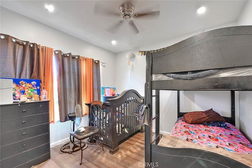 Photo of 6915 Bonsallo Ave, Lake Los Angeles, CA 90044 (MLS # OC25244745)