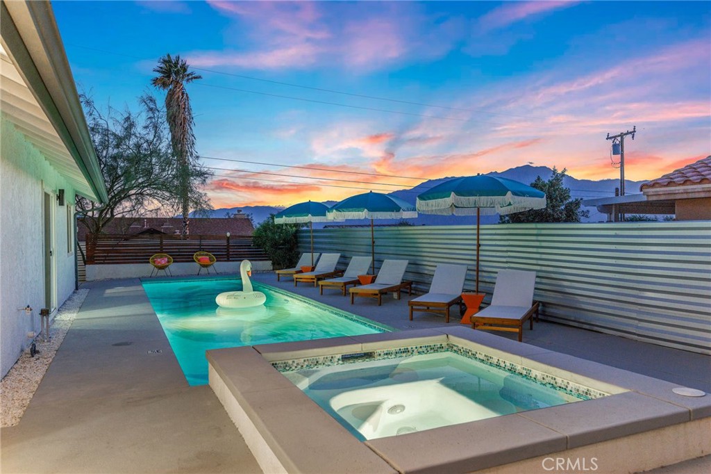 Turn-key furnished and move-in ready, this beautifully maintained 3-bedroom, 2-bath home offers comfort, style, and low-maintenance living in a quiet Desert Hot Springs neighborhood. Perfect as a primary residence, second home, or income-producing property.
Step inside to an open-concept living and dining area with abundant natural light, neutral tones, and durable flooring throughout. The modern kitchen features quartz countertops, stainless steel appliances, and ample cabinet space. A spacious primary suite offers a walk-in closet and private bath, while two additional bedrooms provide flexibility for guests, office, or hobby space.
The backyard is designed for easy desert living with a sparkling pool and spa, shaded patio, and low-water landscaping. Enjoy evenings around the fire pit or dine al fresco in multiple outdoor seating areas.
Featuring an attached 2-car garage with storage, central HVAC for year-round comfort, and fully fenced yard for privacy.
Offered fully furnished for immediate enjoyment or rental use
Convenient Location:
Just 20 minutes to Downtown Palm Springs, 15 minutes to Palm Springs International Airport, and about 40 minutes to Joshua Tree National Park, with shops, dining, and golf courses close by.
Whether you’re looking for a full-time residence, weekend escape, or a turn-key vacation property, this home is ready to deliver.