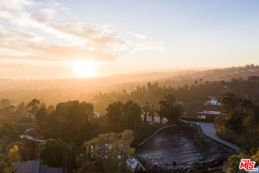 Beverly Hills Development Opportunity with Ready to Issue plans for an incredible 15,593SF (apx.) designed estate by C&C Partners showcasing views over Beverly Hills. Prime private location nestled among some of the city's finest estates. Incredible value.