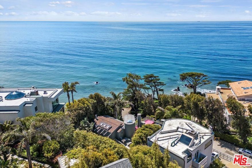 A perfect tranquil Oasis in these turbulant times....Architectural home on a  quiet gated private Cul De Sac located . directly across from the beach entrance to Lechuza Beach off of Broad Beach.  This charming home features a top floor Primary Suite with sitting area, ocean view terrace and office. area. The Middle floor consists of 2 guest bedrooms , living , dining, kitchen and 2 baths. Lower floor has garage, sauna and shower ...plus an outdoor shower for beach outings. This home has an open kitchen floor plan and killer ocean views in most rooms plus each bedroom has an ocean view terrace. Architectural home with lovely views of the ocean and cypress trees, it has a very Northern California feel! Steps to beach entrance. Can bike or walk down Broad Beach to Trancas Market for Starbucks, Vintage Grocers and restaurants.The ultimate in privacy and seclusion.*** A Generac Whole House generator is being installed as there are many days in Malibu in which they shut off power due to winds so a huge bonus.