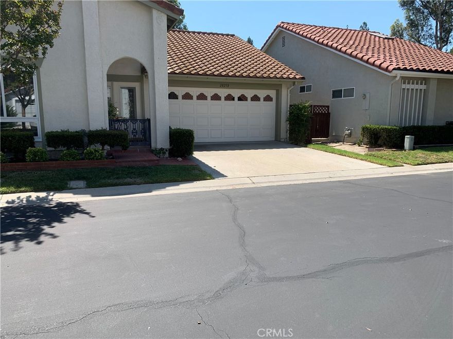 Panoramic view, a newly painted single level house with 3 bedrooms, 2 baths, 2 cars attached garage, upgraded doors and windows, hard wood flooring, covered patio overlooking hills and trees, kitchen with painted cabinets, coffered ceiling, and bay window. Cul-de-sac Location in the 55+ man gated senior community of Casta Del Sol, within a short drive to major shopping centers, and the Lake Mission Viejo.

Casta Del Sol community. Association offers 2 pools of which one is for lap swimming, spa, club house, tennis court, gym, billiard room, craft room, lawn bowling, shuffleboard, library and much more.

Lake Mission Viejo membership is also included, where you can enjoy swimming, fishing, boating, and summer concerts. You also have the privilege of using club house, boat rental and picnic area. The Costa Del Sol Golf course is an 18-hole public course located outside of the main gate.