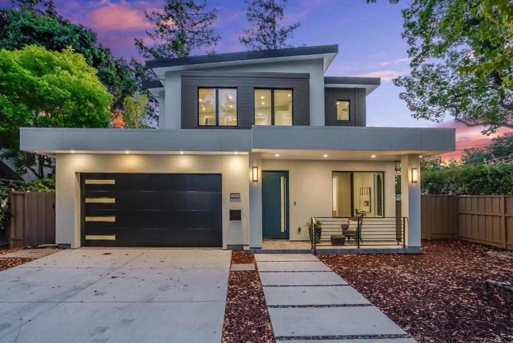 Newly completed in June 2025, this stunning contemporary home blends thoughtful design with luxurious finishes crafted for modern living & refined entertaining. Step through a gallery-style foyer into a dramatic open-concept living & dining space, anchored by a sleek media center & a striking modern staircase. The chef's kitchen is a true showpiece, outfitted with professional-grade Thermador appliances. A custom wine tower adds a touch of elegance, perfect for effortless entertaining. Ample custom cabinetry provides generous storage for all your kitchen essentials, while a fresh air exchange system ensures cooking odors are continuously replaced with clean, filtered air. All four bedrooms feature ensuite bathrooms with Grohe fixtures and Toto bidet toilets, combining comfort and modern luxury for residents & guests. The expansive primary suite opens to a private balcony with views of mature trees while the spa-inspired bathroom includes a soaking tub, oversized shower, & a serene atmosphere to begin or end your day. Engineered for both beauty & performance, the home features a steel framing system, advanced insulation, & dual-zone, energy-efficient HVAC systems all of which can be powered by the home's own solar energy system, offering sustainable living with off-grid potential.