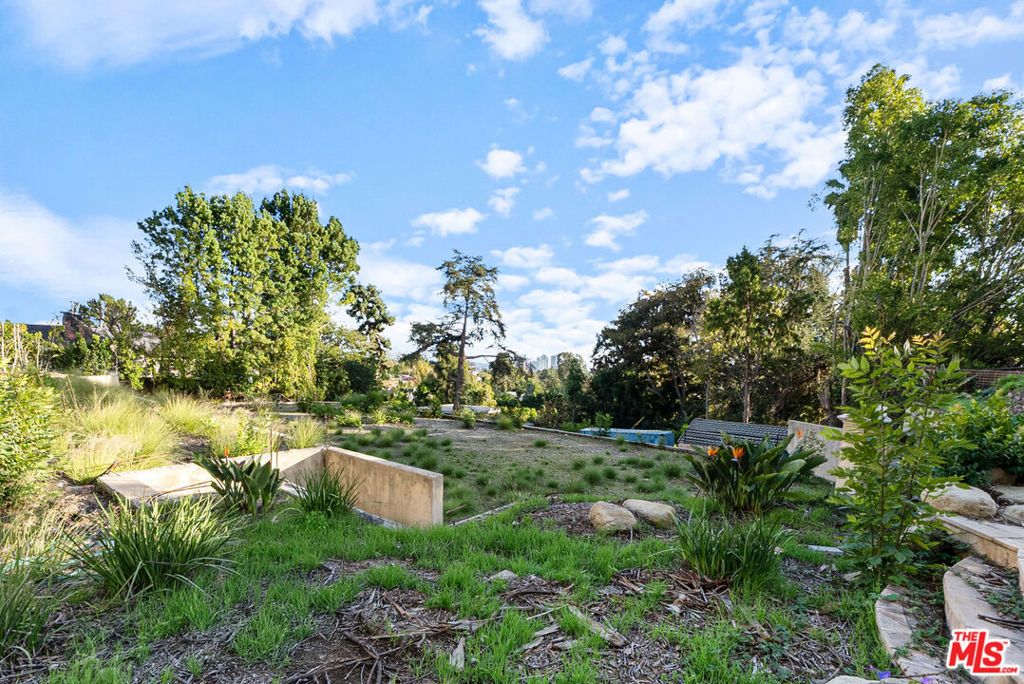 Photo of 1185 Angelo Drive, Beverly Hills, CA 90210 (MLS # 25623463)