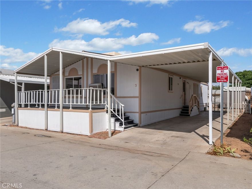Imagine coming home to an updated, light-filled space in the heart of Apple Valley—Welcome to 22020 Nisqually Road, Space 3. Situated in Santiago Apple Valley Estates, an all-age community with resort-style amenities including a clubhouse and pool, this 3-bedroom, 2-bath mobile home offers comfort and value at every turn. Boasting 1,248 square feet, this 1990-mobile home has been lovingly refreshed with a new roof, freshly painted exterior, new furnace, and an energy-efficient tankless water heater. Inside, enjoy the peace of mind that comes with fresh paint in most rooms, wood laminate flooring through-out most of home, and new carpet on the front covered porch. Large living room and dining area with vaulted ceilings all open to the kitchen with newer gas range plus refrigerator included. Both guest bedrooms are good size. Guest bathroom has new vanity and a tub/shower combo. The primary bedroom offers a generous walk-in closet. Indoor laundry room with storage cabinets plus washer & dryer included. A large attached carport and outdoor shed offer ample storage and parking. Fenced back yard. Located near everything you need—schools, restaurants, and shopping—this property is ideal for anyone seeking a strong sense of community and a low-maintenance lifestyle. Don’t miss this opportunity to settle into one of Apple Valley’s most welcoming neighborhoods.