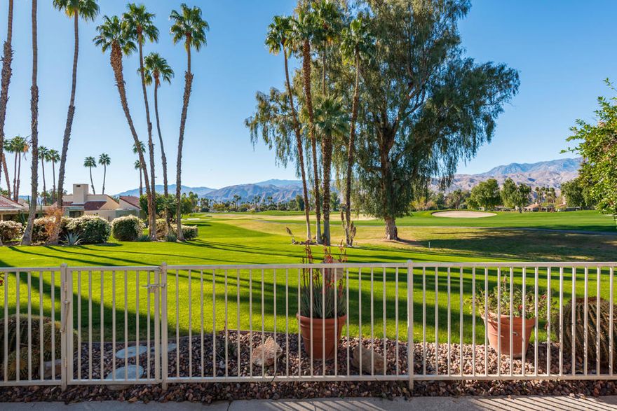 Stunning location on the Dinah Shore Tournament Course in Mission Hills Country Club.  Fabulous view down the 2nd fairway to our southern mountain range.  Beautifully updated, with Modern flair, the home features marble fireplace and hearth, updated ceilings & lighting throughout and custom handholds for step down living room.  The kitchen remodel includes pull out shelving, stainless appliances and custom serving area in dining room.  The master bath update & remodel consists ofmulti head steam shower, Jacuzzi-like tuband ceiling windows which brings the outside in.On the back patio you will fine gorgeous patiofurnishings with a gas BBQ included.Seller has updated land lease.
