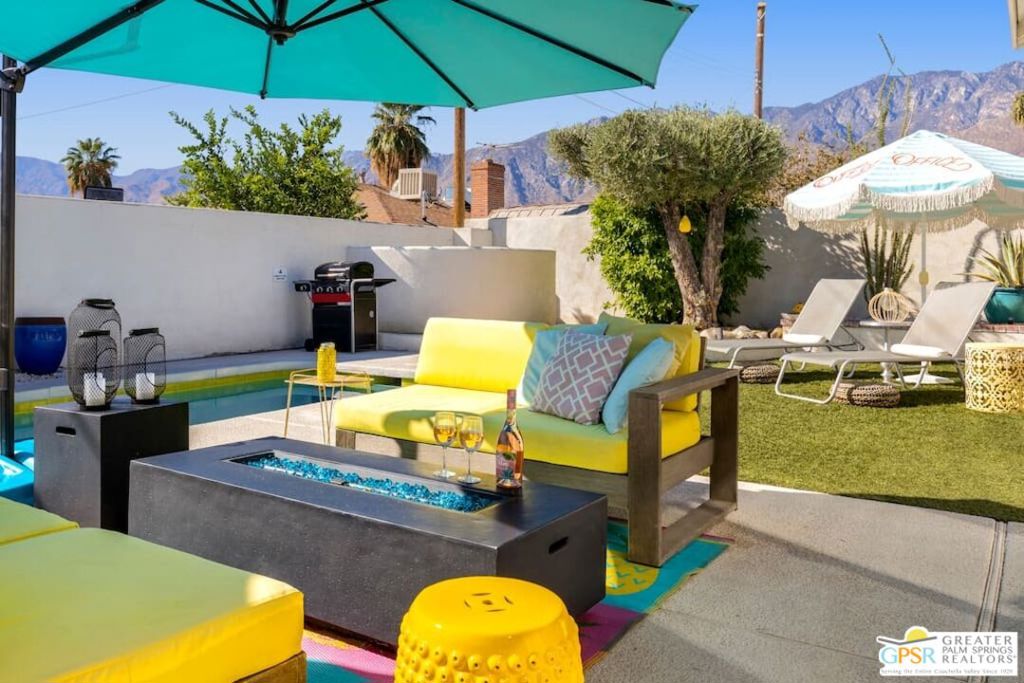 Season | October - April: $$ - $8,890 per month Summer | May - September: $$ - $3,556 per month Available for Seasonal Rental Only 1 to 6 Months. This property is offered exclusively for short-term seasonal stays. Long-term leases beyond 6 months are not available. Dates go fast! For the most up-to-date availability and to explore all of our properties, please visit APEK Rentals online. You'll find the live calendar dates and easy booking options there. Enjoy a stylish experience at this centrally-located luxury home just minutes away from Downtown Palm Springs. Recently renovated from top to bottom, features all of the highest quality amenities to give your trip the experience you deserve. Featuring a large pool and fire pit, with more than enough seating and daybeds to accommodate any group of people. Take a quick drive or Uber to downtown to enjoy all of the amazing Palm Springs experiences easily! Highlights: *Expansive patio with pool and spa, BBQ, lounge area. *3 bdrms, 2 baths, Fast Wi-Fi *Fully-equipped modern kitchen *10 min drive to Downtown Palm Springs, less than 50-min drive to Joshua Tree National Park. Living Area: * Enjoy an open area with plenty of comfortable seating and streaming-ready Smart TV, perfect for sports or movie nights, *Expansive glass slider allows seamless transition between indoor and outdoor living spaces. *Convenient access to the backyard from multiple locations in the home. Kitchen & Dining: *Fully equipped kitchen with ALL NEW appliances, ready for you to make delicious meals with elegant dish ware and glassware as well as a coffee station. *Appliances include stove/oven, professional hood, microwave, dishwasher, fridge freezer, and blender. *Coffee options include ground coffee makers. *The dining room table seats 8 comfortably with seating. Bed & Bath: *This home sleeps 8 guests, in 3 uniquely-themed bedrooms. Outdoor Space: *Private backyard with a pool and spa. *Fire up the grill and cook some delicious steaks/veggies. *Fire pit. For Kids: *1 highchair and 1 Pack 'n Play available upon request at no extra charge. *Plastic-ware *Board games Extra Perks and Essentials: *Complimentary Wi-Fi, a washer/dryer, coffee.