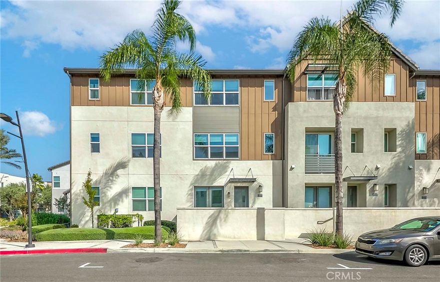 Welcome to this stunning 3-story condo offering modern living in a highly desirable resort-style community. With approximately 1,740 sq. ft., this home features 3 bedrooms + a den, 2 full bathrooms, and 2 half bathrooms, providing comfort and convenience for any lifestyle.The first level includes a versatile den, perfect for a home office or flex space, along with a convenient half bathroom. From the den, double doors lead to a charming front balcony. Direct access to the attached 2-car garage adds everyday ease.On the second level, you’ll find an inviting open-concept living area with a spacious living room and a modern kitchen featuring a large center island and stainless-steel appliances. Stylish lighting enhances the contemporary feel. A second half bathroom is also located on this floor for added convenience. Step out to the balcony to relax and enjoy outdoor living.The third level includes three bedrooms and two full bathrooms. The primary suite offers a walk-in closet and a private en-suite bathroom. For added practicality, in-unit laundry is also located on the upper level.This home is equipped with modern upgrades including a smart thermostat, tankless water heater, and window blinds throughout.Residents of this exceptional community enjoy outstanding amenities such as a large gated swimming pool and spa, clubhouse, fitness center, BBQ area, and dog play area. Conveniently located near community shopping and restaurants, you’ll have everything you need just moments away — all while enjoying a true resort-style lifestyle.