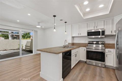 Photo of 142 Stanford Court #71, Irvine, CA 92612 (MLS # OC26188134)