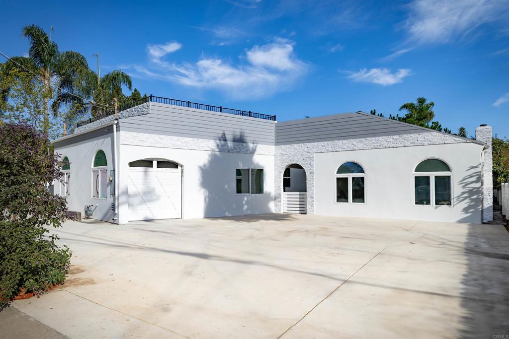 Luxury Coastal Living with Ocean Views & Income Potential in beautiful Fire Mountain, Oceanside. Experience the epitome of coastal luxury in this fully remodeled, one-story contemporary home located just moments from Oceanside's pristine beaches and iconic pier. Seamlessly blending sophisticated design with modern comfort, this residence boasts a bright and open-concept living space, highlighted by soaring ceilings in the great room, creating an expansive and airy ambiance. The main residence features 4 bedrooms and 3 beautifully appointed bathrooms, each showcasing the meticulous attention to detail in this complete "inside-out" renovation. Prepare culinary delights in the designer kitchen, featuring high-end & state of the art appliances, countertops & finishes. Beyond the main home, discover the incredible versatility of a fully permitted, one-bedroom Accessory Dwelling Unit (ADU). This presents an exceptional opportunity for generating rental income, hosting guests, or providing a private space for family members, potentially boosting the property's value by 10-25%. ADUs are a popular solution for affordable housing, multi-generational living, or even aging in place. The crown jewel of this coastal gem is the sprawling 1100 square foot rooftop deck, offering panoramic ocean views that stretch as far as the eye can see. Imagine entertaining guests against breathtaking backdrops of sunsets over the Pacific, enjoying a morning coffee with the refreshing sea breeze, or simply unwinding in your private coastal haven. The deck provides ample space for outdoor dining, lounging, and creating unforgettable memories. This home is more than just a residence; it's a lifestyle. Enjoy easy access to Oceanside's vibrant dining scene, boutique shops, and world-class surfing all within minutes of your doorstep. Don't miss this rare opportunity to own a piece of paradise that perfectly balances luxury, convenience, and income potential. Schedule your private tour today.