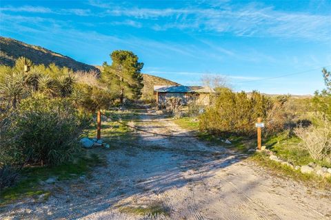 Photo of 50310 Ash Dr, Morongo Valley, CA 92256 (MLS # JT26006162)