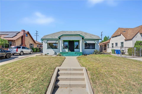 Photo of 1023 W 73rd ST, Los Angeles, CA 90044 (MLS # SR26191791)