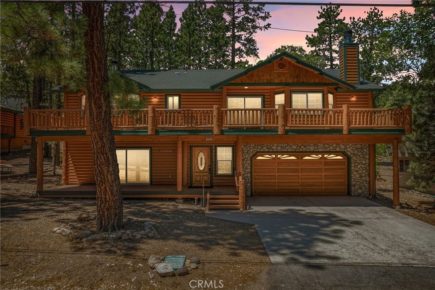 Your Mountain Escape Awaits – Just Minutes from Snow Summit and Bear Mountain!
This beautifully maintained log-style home delivers the ultimate Big Bear lifestyle—whether you're looking for a full-time residence, vacation getaway, or short-term rental investment. Ideally located less than 5 minutes to Snow Summit and Bear Mountain, this 3-bedroom, 3-bathroom home offers 2,409 sq ft of spacious, versatile living.
Step inside to discover a light-filled Great Room with soaring vaulted tongue-and-groove ceilings, a cozy stone fireplace, and direct access to an oversized front deck—perfect for morning coffee or evening gatherings. The open-concept kitchen is designed for entertaining, featuring granite countertops, stainless steel appliances, a custom range hood, and a large breakfast bar. A convenient door leads to the back deck and fully fenced yard—great for pets, kids, or just relaxing in nature.
Downstairs, you'll find a HUGE game/media room that’s a total showstopper—complete with a 75” cinema-style TV, pool table, arcade game, stone fireplace, and a full bathroom. It’s the perfect space to entertain or unwind after a day on the slopes.
Other features include:
* Oversized attached 2 car garage with space for all your mountain toys
* Level parking and covered entry for easy, year-round access
* Updated flooring and fresh, mountain-style finishes throughout
* Spacious decks and a large yard - ideal for BBQs and outdoor fun
Most furnishings are negotiable, so you can move right in and start enjoying mountain living from day one.
This is more than just a home—it’s a lifestyle. Don’t miss your chance to own a slice of Big Bear paradise!