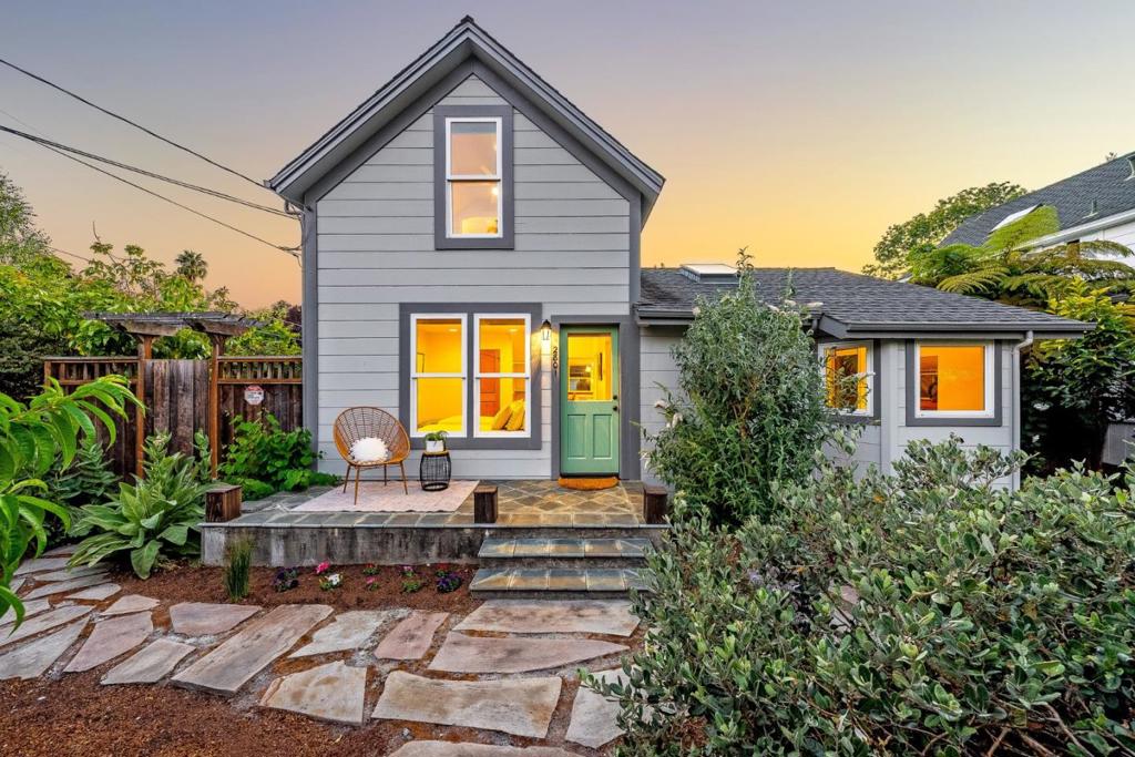 Location, location, location! This stunning circa 1890 home is nestled in one of the most sought-after areas of Soquel, providing the perfect blend of historic charm and modern convenience. Just a short stroll away, you'll find either Soquel or Main Street Elementary, popular eateries such as Home Restaurant and Sunrise Cafe, and the vibrant local shops that make this community so special. Lovingly updated and maintained, this residence was once part of a charming bed and breakfast and still retains its potential zoning use, offering remarkable versatility. With 3 bedrooms and 3.5 bathrooms, the interior space boasts a delightful blend of elegance and comfort, featuring beautifully refinished hardwood floors throughout and abundant natural light from skylights that enhance the airy atmosphere. The grounds of this property are nothing short of spectaculara gardeners dream! Spanning 6,011 square feet, the meticulously maintained yard is home to a diverse array of fruit trees that will leave you in awe, providing fresh fruit at your fingertips. With 1,443 square feet of living space, this home also features a large pantry, perfect for your culinary adventures, and is located just minutes from the renowned Gayles Bakery, Capitola Village, and the stunning beaches of the area.