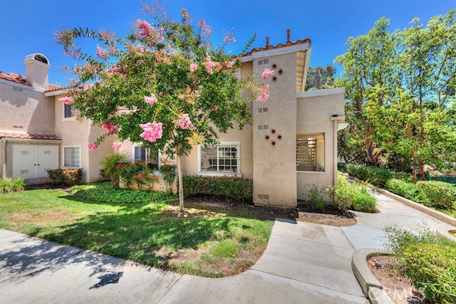 Step into this charming ground-floor condo in the heart of Rancho Santa Margarita, where comfort, style, and convenience come together effortlessly. This 2-bedroom, 1-bathroom home features a private gated patio—ideal for relaxing or entertaining—and is just steps from the community pool and spa. Inside, enjoy modern upgrades including new flooring, stainless steel appliances, and quartz countertops. The prime ground-floor location offers easy access to your nearby carport and additional permitted parking, with guest and street parking available as well. Located just minutes from the RSM Lake, you’ll love the sand-bottom swimming lagoon, catch-and-release fishing, and scenic walking paths. As a resident of the SAMLARC community, you’ll also enjoy access to Olympic-size pools, tennis and basketball courts, sand volleyball, and a calendar full of community-hosted events. With the Paseo shopping center, restaurants, parks, and four grocery stores just a short distance away, this home truly captures the best of Rancho Santa Margarita living.