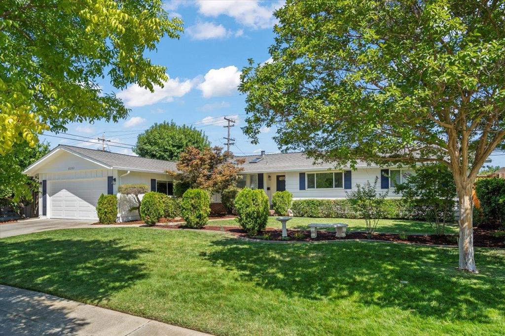 Quintessential Almaden Valley ranch-style home on an expansive 10,000+ sq. ft. corner lot with 4 bedrooms and 2 baths. Recent upgrades include a new roof, new A/C, freshly painted interior and exterior, refinished hardwood floors, recessed lighting, and new fixtures. Light-filled living room with fireplace and oversized windows, plus a separate family room with large slider leading to the backyard patio and sparkling pool. Oversized kitchen with skylights, built-in desk, and abundant workspace. Located in the sought-after Leland High School attendance area (buyer to verify).