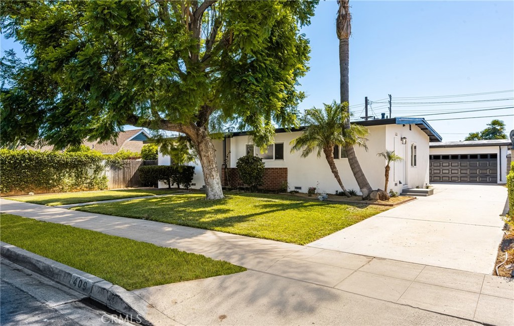 This is it! This is the most affordable turnkey Single Family Residence in all of Orange County! An amazing opportunity to own a beautifully renovated 3 Bed, 2 Bath home! Located just a stone's throw away from Disneyland, Angel Stadium, and the Convention Center, this property is centrally located as a prime residence for a primary owner, or as a long term investment. Every part of the home has been beautifully transformed! Upon pulling up to the home, the curb appeal creates pride of ownership that is rare. The home is perfectly located within the neighborhood - for both convenience & serenity. The exterior of the home has been upgraded with premium paint & trim, upgraded landscaping, beautiful double pane vinyl windows, and an upgraded roof. Once you enter the home through the front door, a beautiful & functional layout is immediately experienced. The open floor plan is absolutely perfect for entertaining friends & family, and also provides the premier environment for personal enjoyment & relaxation. The floor has been upgraded with luxury vinyl plank, and is newly installed throughout the entirety of the home. The kitchen is completely renovated - with new cabinets, high end countertops, new dishwasher, new microwave, new stove, upgraded LED canned lighting, and remodeled tile backsplash. The home also has a very functional detached 2 car garage, providing superb functionality. This beautiful home is too good of an opportunity to let slip through your fingers today!