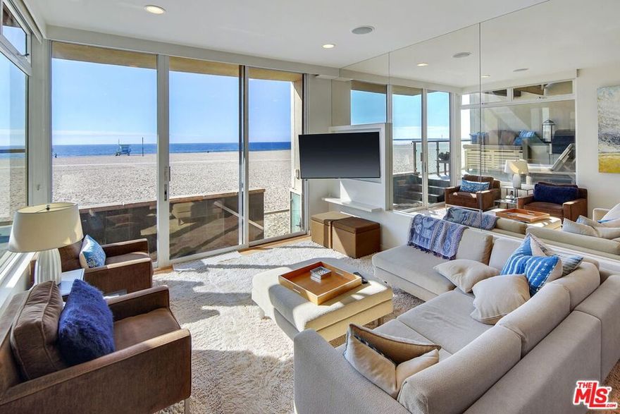 Beach living at it's finest offered by this designer 2 Bd 2 Ba Condo with breathtaking Ocean and sunset views from almost every room. Ocean front Master Bedroom leads to large entertaining patio with built in Lynx BBQ and elevated day bed for entertaining guests with rare direct access to the beach gives the feeling on being on a permanent vacation. The open kitchen with honed granite, top of the line appliances and glass tile backsplash with cooks Island. Dining area leads to open living room with Views from Palos Verde to Malibu. Bamboo floors throughout Floor to ceiling windows with motorized remote controlled blackout shades for privacy. Central heat, and air for that occasional day when the ocean breeze is not blowing. 2 car parking in garage. Property is offered fully furnished.