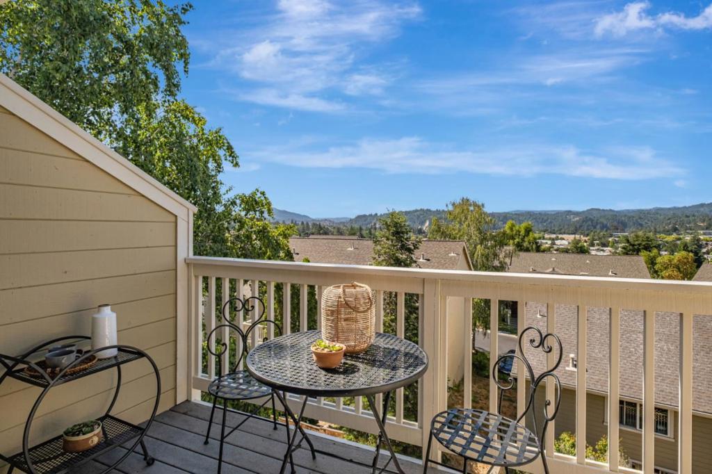 Welcome HOME! Enjoy peaceful living with incredible sweeping views in this spacious 3 bedroom, 2 bathroom townhome in the heart of Scotts Valley. Surrounded by nature, this home offers a serene retreat just minutes from Hwy 17 making it ideal for commuters. The open floor plan features travertine tile, a bright living area, a functional kitchen, and generous bedrooms with great natural light. Enjoy rare central air conditioning, a true bonus for warm summer days in the valley! The two car garage and larger driveway make for great storage and parking. With 12+ parking spaces directly across from the unit, you'll have more than enough room for visiting friends and family. Live close to shops, restaurants, parks, and top-rated schools, all while enjoying the quiet beauty of nature. This is Scotts Valley living at its best!