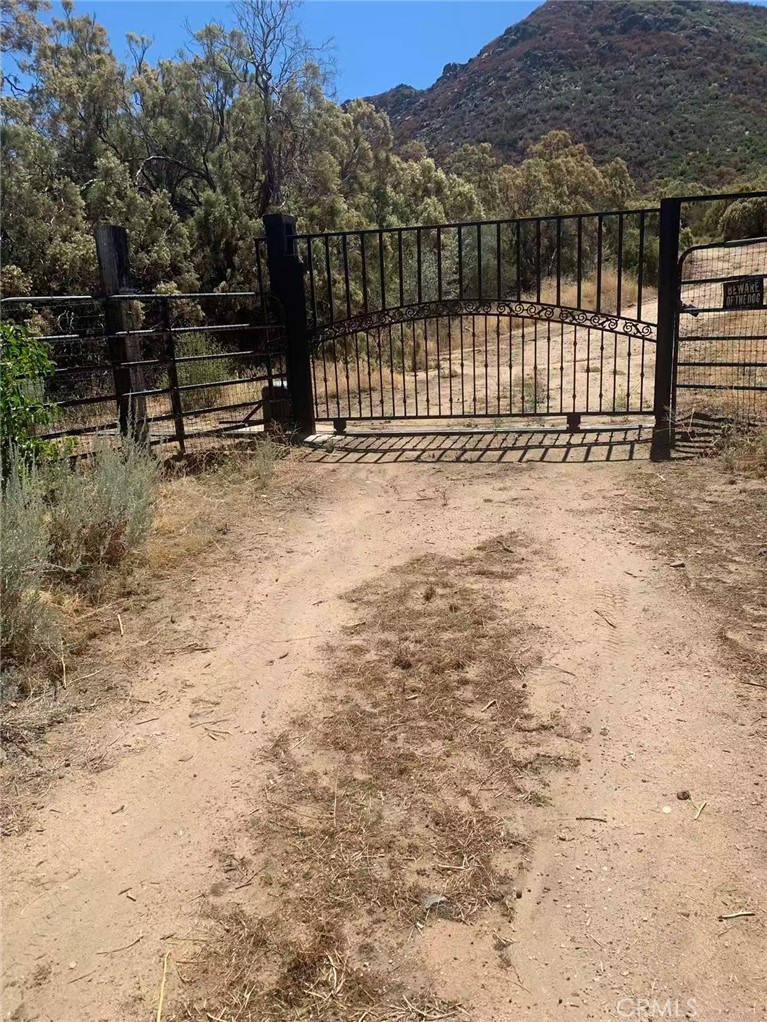 If you’re searching for the perfect piece of land to create your own paradise, look no further! This secluded 3.9-acre parcel offers some of the most breathtaking views you’ll find. The property is mostly flat, fully fenced, and features a convenient automatic electric gate. Power is already connected, supplying the high-producing water well that delivers over 20 gallons per minute.
Located just off a paved road, the land offers plenty of room to place a manufactured home, build your dream residence, or even do both—while still leaving space for animals, vehicles, boats, RVs, and recreational toys. With its agricultural potential and stunning surroundings nestled in the foothills, you’ll enjoy sweeping views of both the mountains and valley.
This is a rare opportunity to own a versatile property with privacy, convenience, and unmatched natural beauty.
