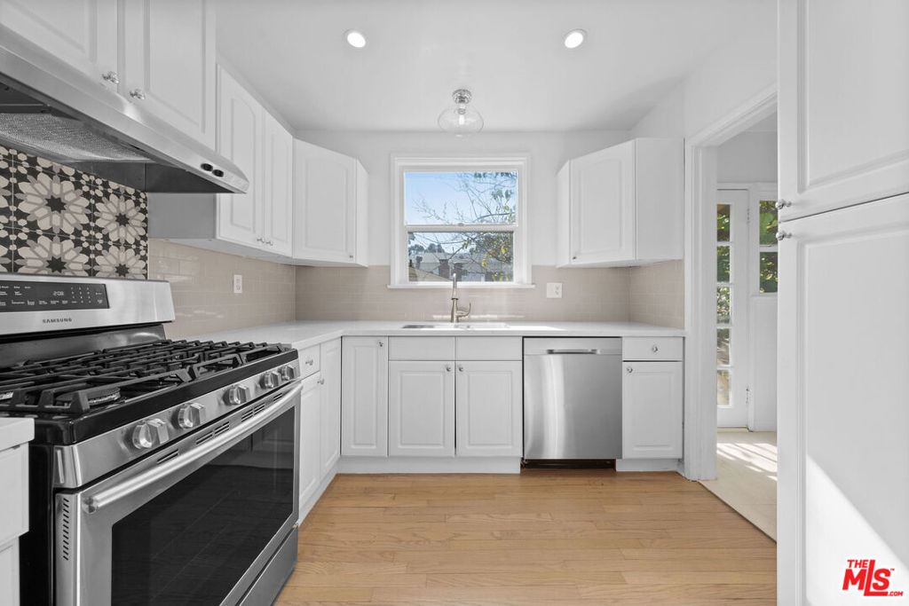 Completely renovated, turnkey, and designer-donethis exceptional Brentwood Glen residence offers elevated living in one of the Westside's most sought-after neighborhoods. Set in a private and secure triplex, this spacious 2-bedroom, 1-bathroom upper-level unit has been fully updated throughout, featuring wide-plank French White Oak floors, recessed lighting, and central HVAC (heat and AC). The modern kitchen boasts stainless steel appliances and sleek finishes, while the bathroom has been beautifully remodeled with timeless, upscale touches. The unit also includes a dedicated laundry room, generous closets, and a separate bike/storage nook. Step outside to a massive, fully privatized backyard, professionally landscaped and perfect for outdoor living and entertaining. Pet-friendly and move-in ready. Located in the highly coveted Kenter Canyon School District!