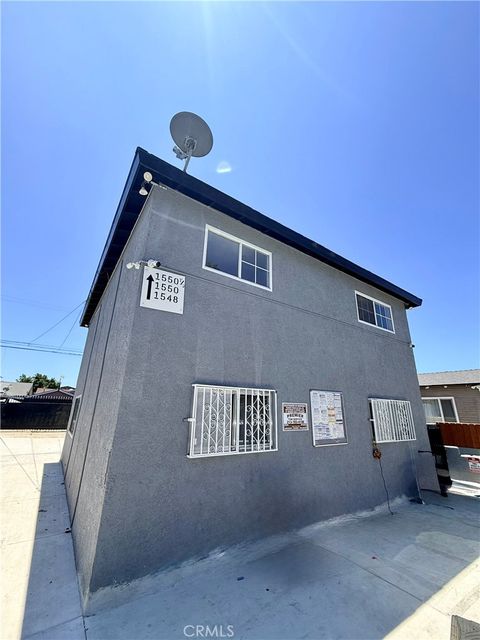 Photo of 1550 1/2 W 59th Place, Los Angeles, CA 90047 (MLS # SB26161231)