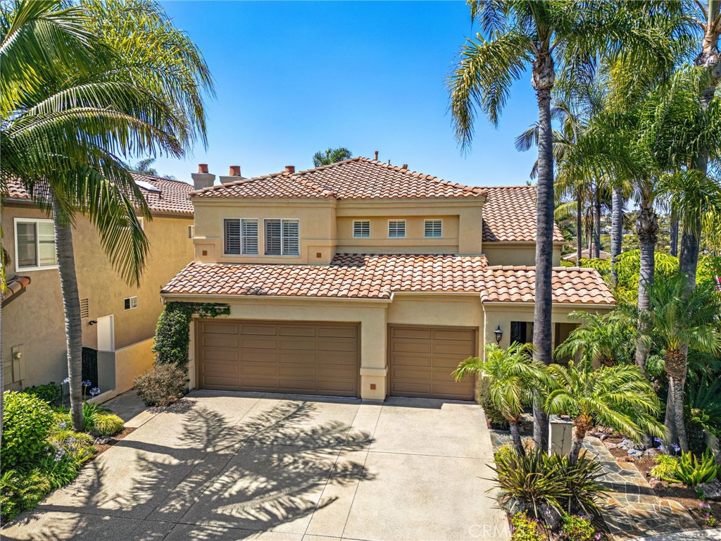 Welcome to an exquisite retreat, where elegance meets contemporary comfort in this 4-bedroom, 3-bathroom haven, encompassing 2,617 square feet of refined living space. Situated on a peaceful cul-de-sac, this residence is located on a desirable single-loaded street, offering both privacy and breathtaking vistas.
Step inside to discover a seamless blend of modern updates and timeless charm. The meticulously designed interior provides a gracious atmosphere, perfect for both relaxation and entertaining. Outside, the luxurious outdoor space invites you to unwind with a sparkling pool, soothing spa, and a cozy fire pit, ideal for enjoying serene evenings under the stars. For those who love to entertain, the built-in BBQ is a standout feature, creating an inviting setting for alfresco dining and memorable gatherings.
This exceptional home also includes a spacious 3-car garage, providing ample storage and convenience. In addition to the home's captivating features, residents can enjoy the outstanding amenities of the Marina Hills community. This prestigious neighborhood offers access to a sparkling community pool, tennis courts, and beautifully maintained green spaces. In addition for the sports enthusiast, there are pickleball courts and bocce ball, while families will appreciate the tot lot, offering fun for all ages. Embrace a lifestyle of sophistication and tranquility in this beautifully appointed home, where every detail has been thoughtfully crafted to offer a harmonious living experience. Close to shopping, restaurants, freeways and beaches. Live the good life in Laguna Niguel!