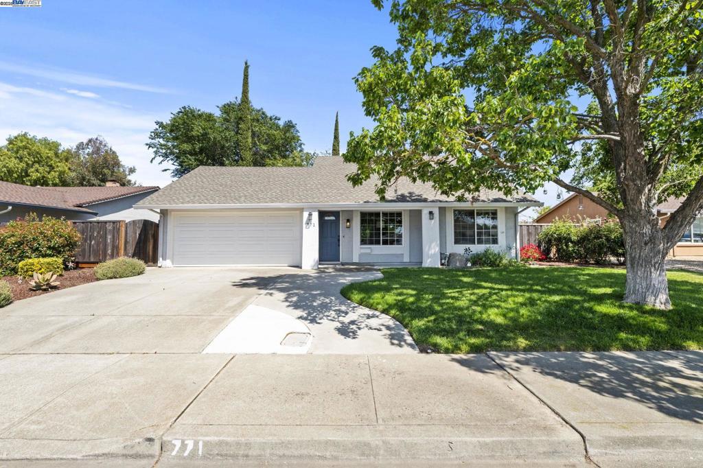 Welcome to 771 Hagemann Drive, a beautifully maintained 4-bedroom, 2-bath home in one of Livermore’s most family-friendly neighborhoods. Located within walking distance of top-rated schools and close to Highways 580/680, parks, and a BART park-and-ride, it’s perfect for families and commuters alike. Inside, an open-concept layout is filled with natural light. The living and dining areas flow into an updated kitchen with granite countertops, stainless steel appliances, and ample storage—ideal for daily living and entertaining. The main level offers two bedrooms and a full bath, while upstairs includes two more bedrooms, another full bath, and a spacious bonus room with ductless mini-split, added insulation, and attic access—great for a home office or retreat. Modern comforts include a smart climate control system with remote access, central heat and air, dual-pane windows, and an EV-ready two-car garage. Outside, enjoy a peaceful backyard with mature fruit trees, a large patio, and plenty of space to relax or garden. With its thoughtful layout, quality upgrades, and unbeatable location, this Livermore gem is move-in ready.